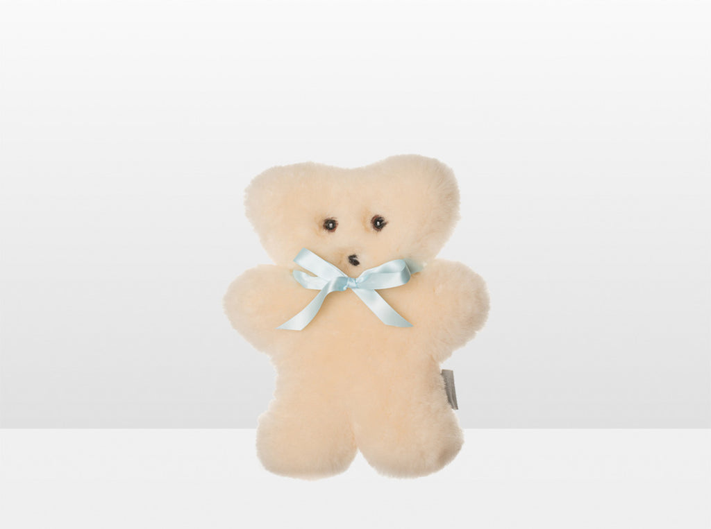 Kids Cream Sheepskin Flat Bear with Blue Ribbon